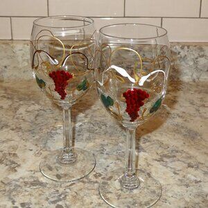 2 Hand painted wine goblets, signed and dated by artist fruit pattern
